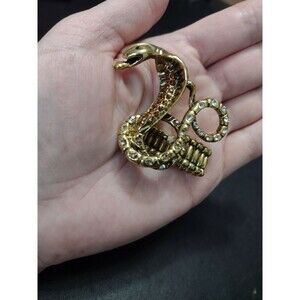 Gold tone rhinestone snake ring